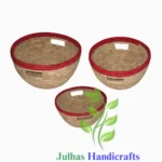 DATE LEAF ROUND DHAMA BASKET WITH CUTOUT HANDLE MANUFACTURER AND EXPORTER JULHAS HANDICRAFTS BANGLADESH